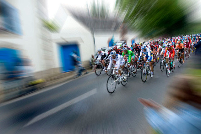 The blur of the peloton. Photo: Alain Bachellier